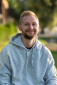 Travis L.